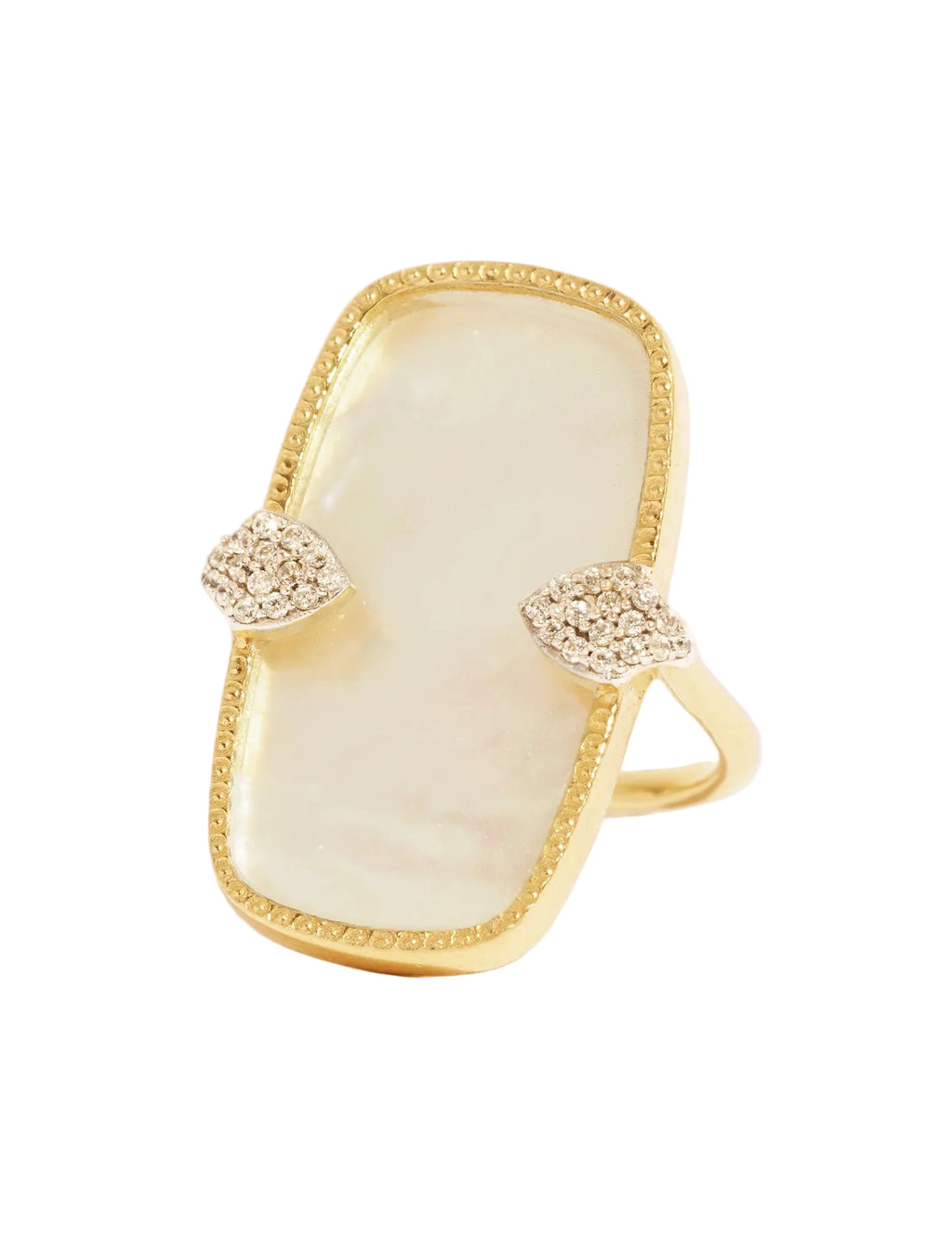Gold ring with pearl-like center and diamond-like accents on a beige background