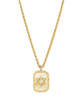 Gold necklace with a rectangular pendant featuring a star design on a white background
