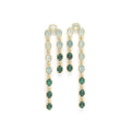 Pair of earrings with green gemstones on a white background.