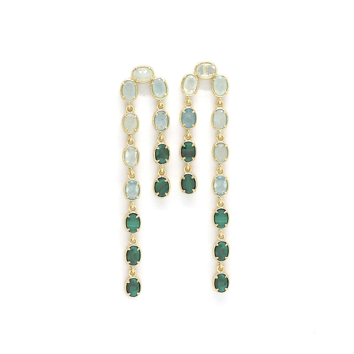 Pair of earrings with green gemstones on a white background.