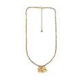 Gold necklace with an elephant pendant