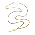 Gold necklace with a clasp on a white background.