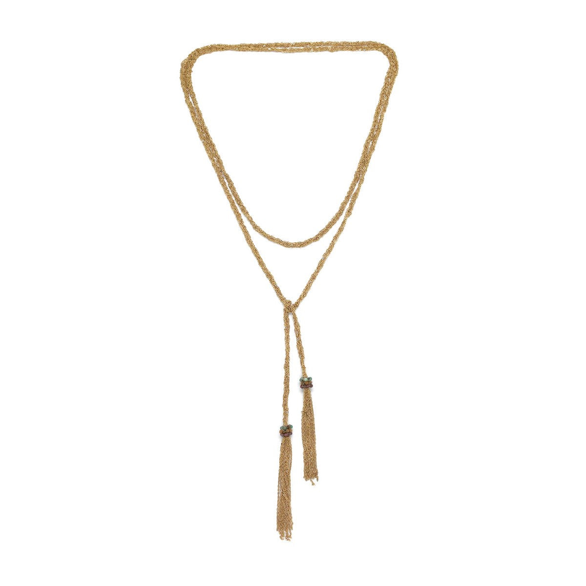 Gold necklace with tassels on a white background